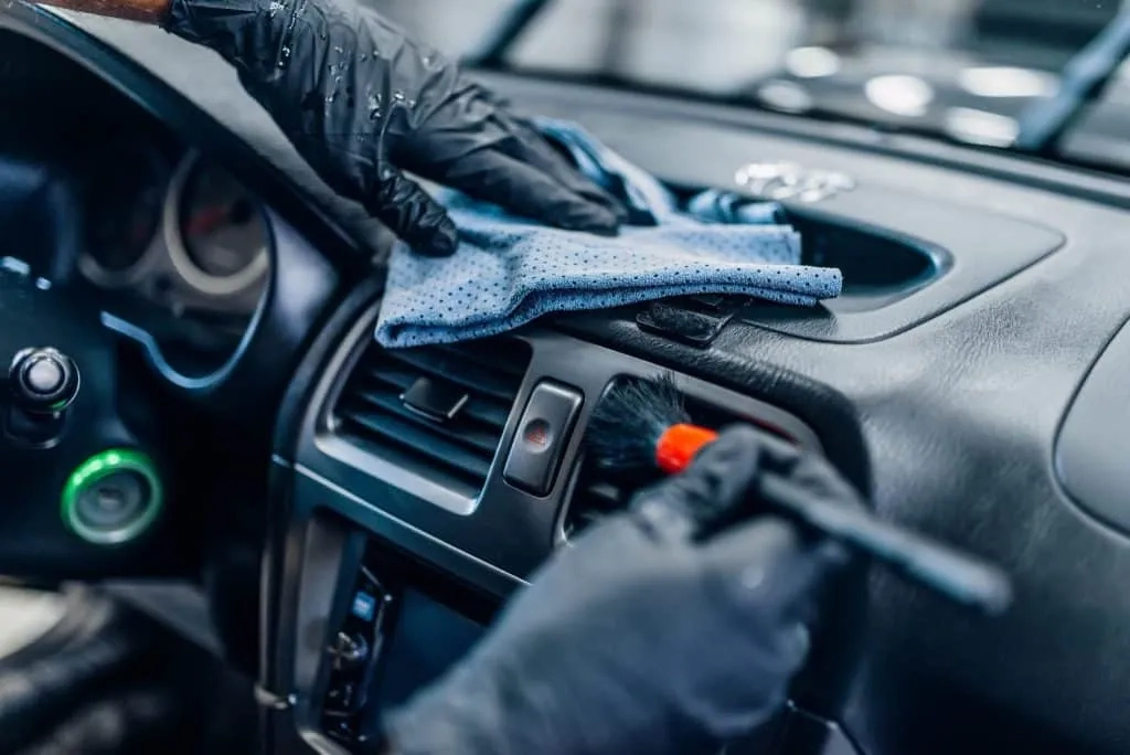 Professional detailing of a vehicle’s dashboard and interior